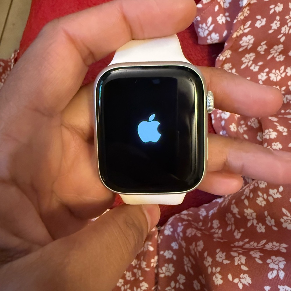 Apple Smartwatch with Silver Case and White Band